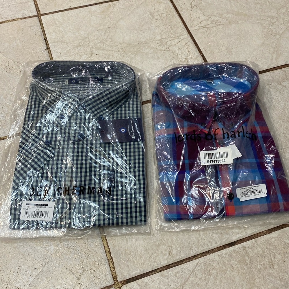 2 men's shirts. Never opened. Son ordered and forgot about them. NWT